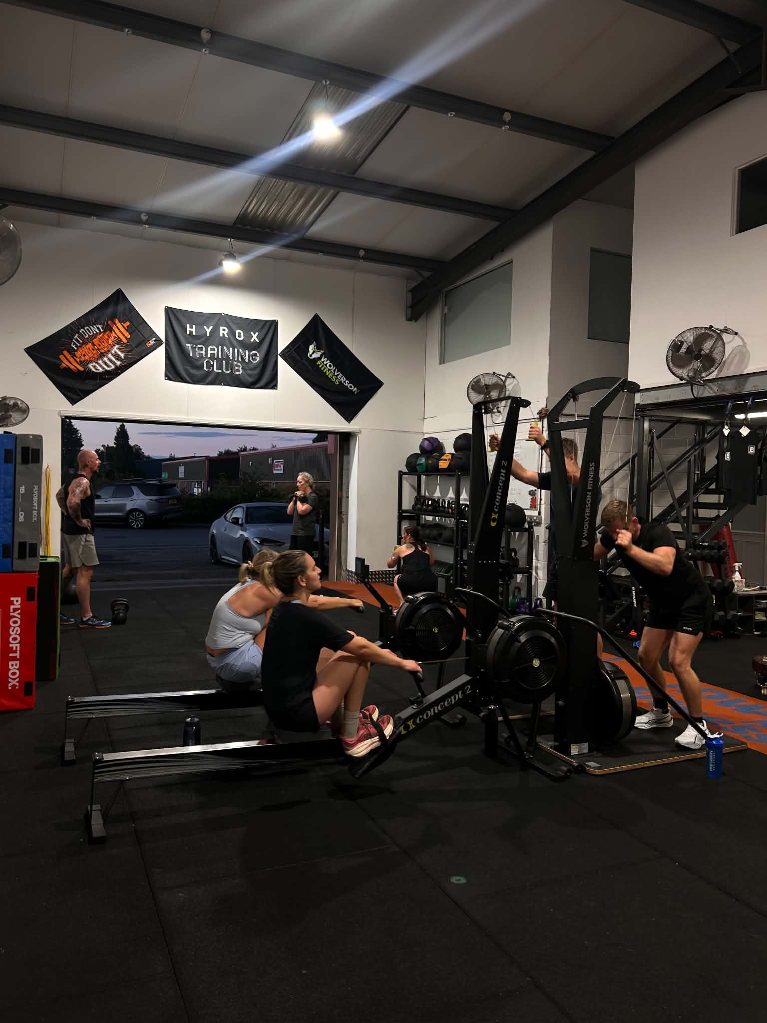 Rowing machines in use during a group conditioning session