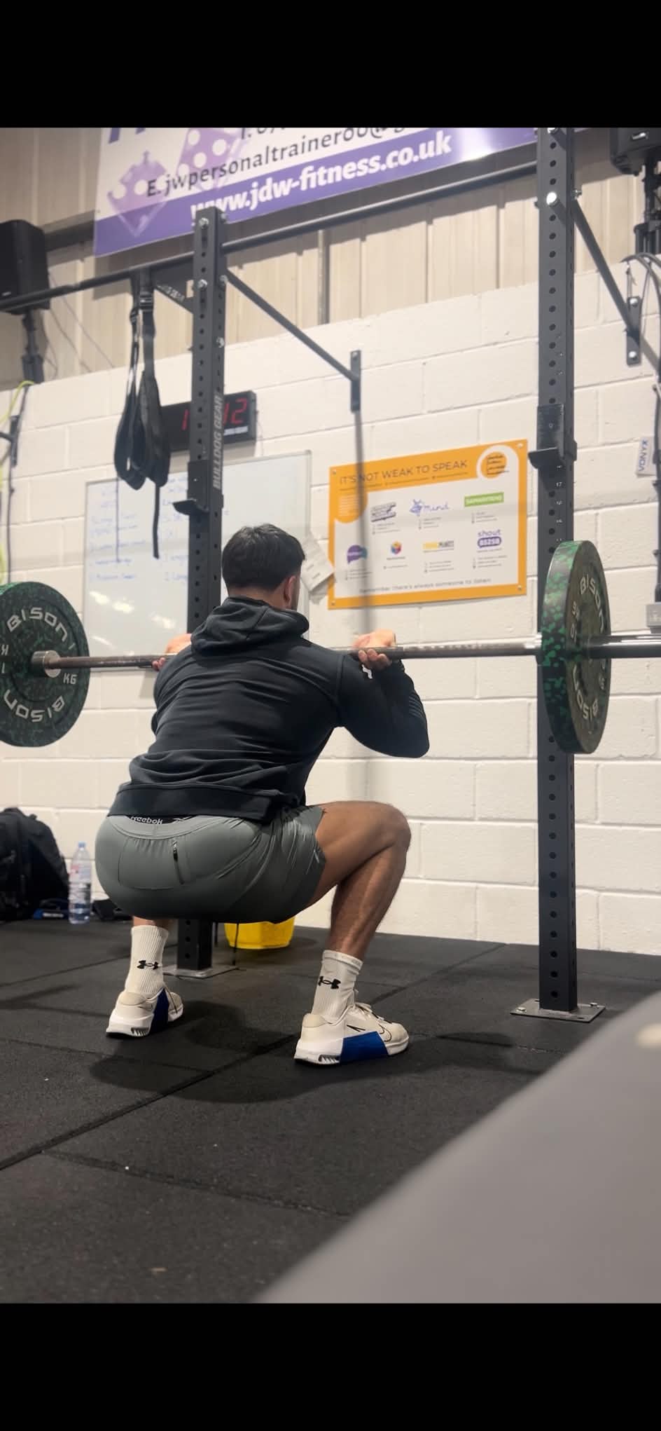Barbell front squat in the gym
