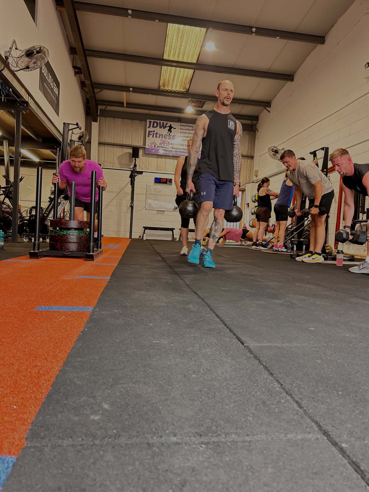 Athlete jumping during a group conditioning workout